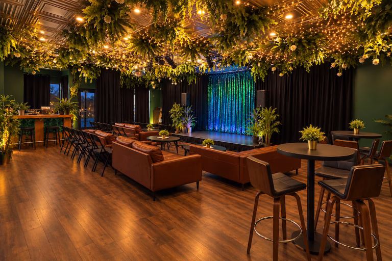 The Green Room in twilight with green and purple stage lighting